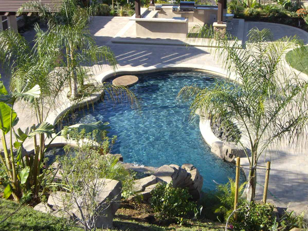 Inspiration for a transitional pool remodel in Orange County