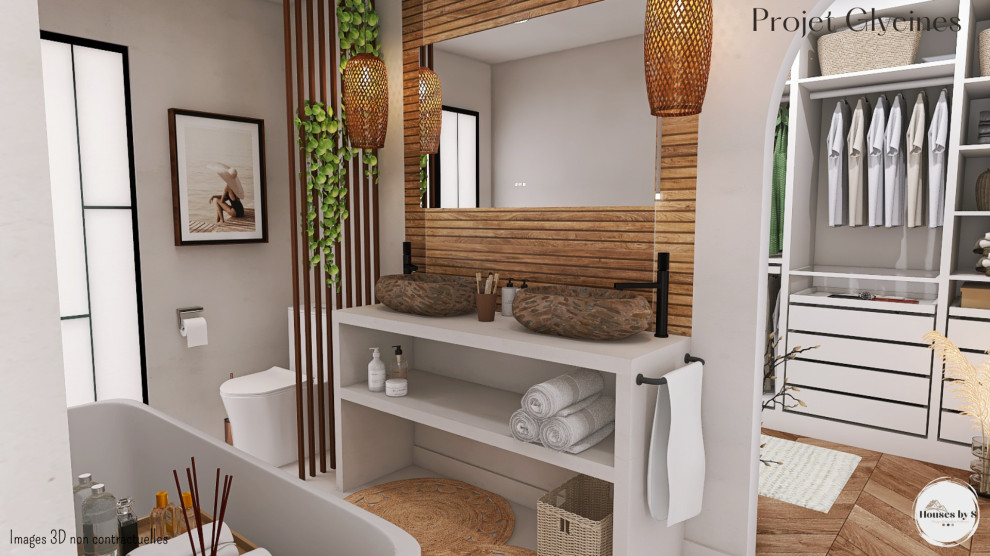Esempio di una stanza da bagno padronale minimalista di medie dimensioni con vasca da incasso, piastrelle beige, pareti beige, pavimento in cemento, top in cemento, top beige, due lavabi e mobile bagno incassato