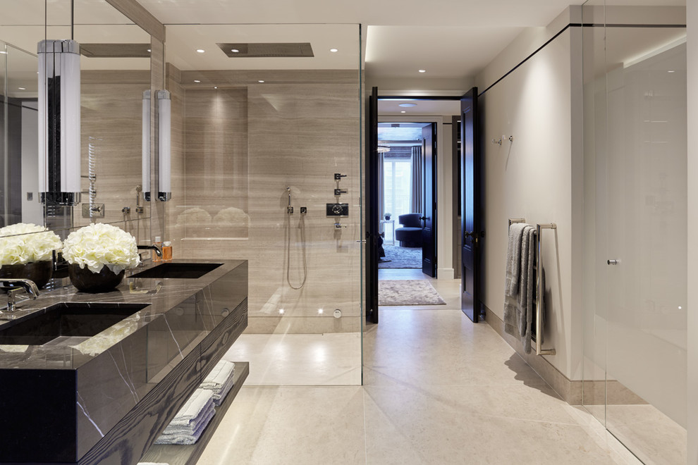 Photo of a contemporary bathroom in London with an integrated sink and a corner shower.