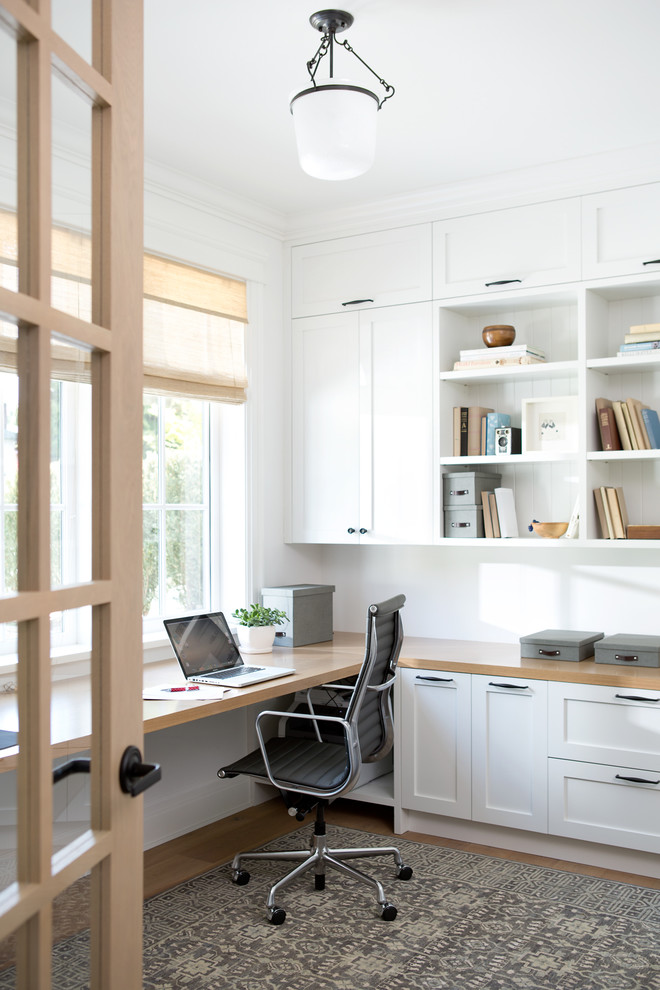 Design ideas for a beach style home office in Vancouver.