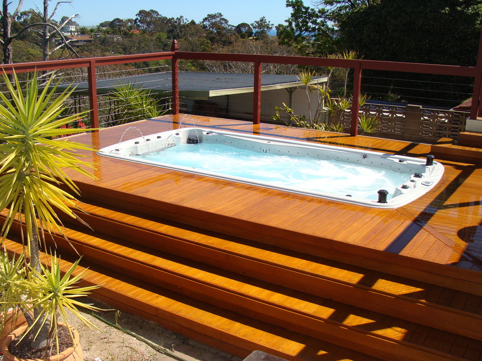 Photo of a small backyard rectangular aboveground pool in Adelaide.