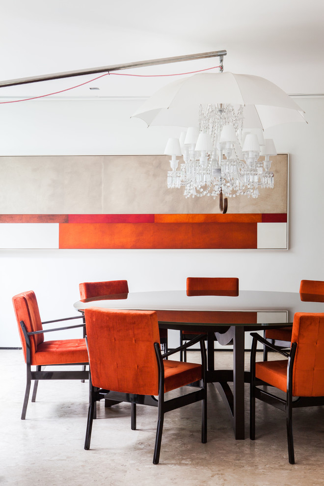 Photo of a contemporary dining room with white walls.
