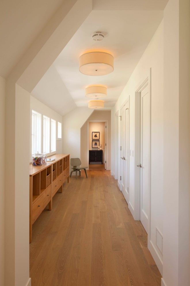 Contemporary hallway in Minneapolis with white walls.
