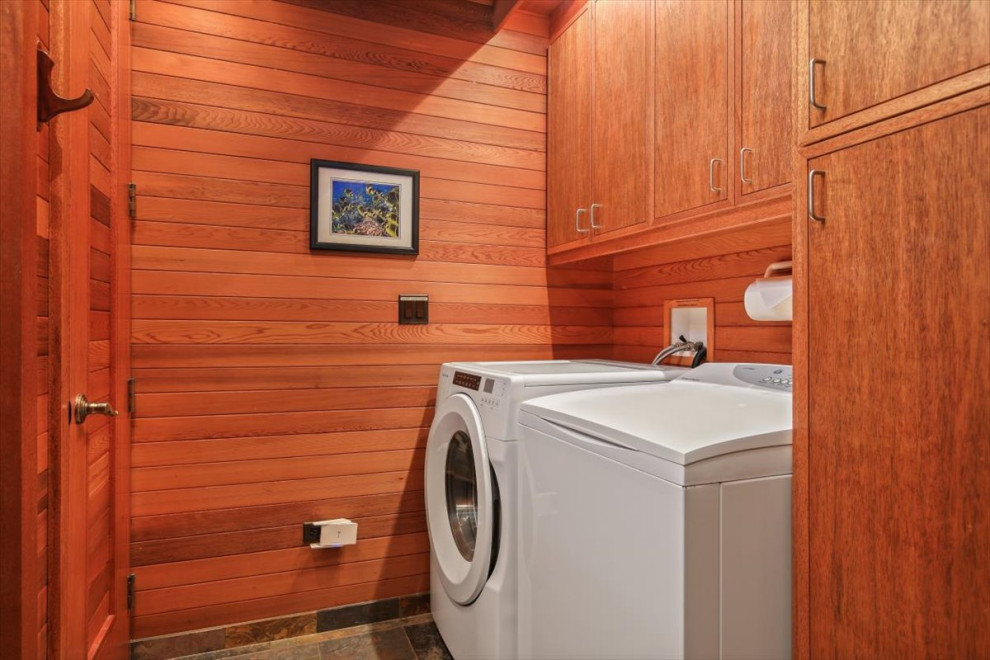 Example of a large island style laundry room design in Hawaii