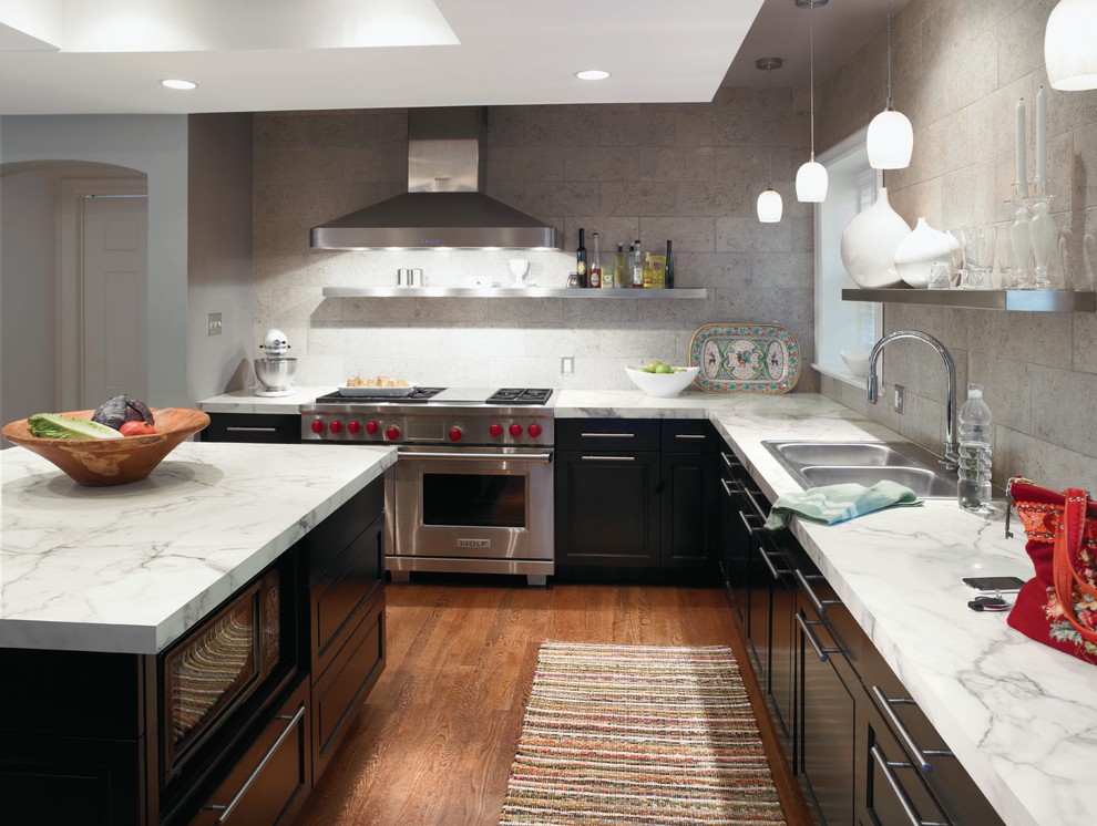 Photo of a contemporary kitchen in Cincinnati with stainless steel appliances and laminate benchtops.