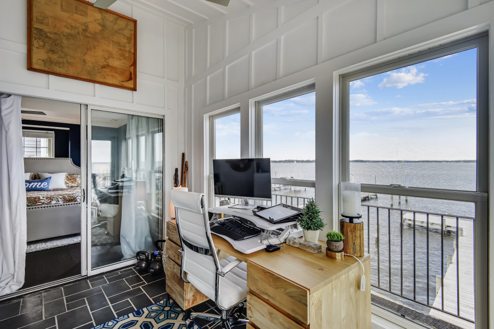 This is an example of a small traditional home studio in Baltimore with white walls, slate floors, no fireplace, a freestanding desk, grey floor, coffered and decorative wall panelling.