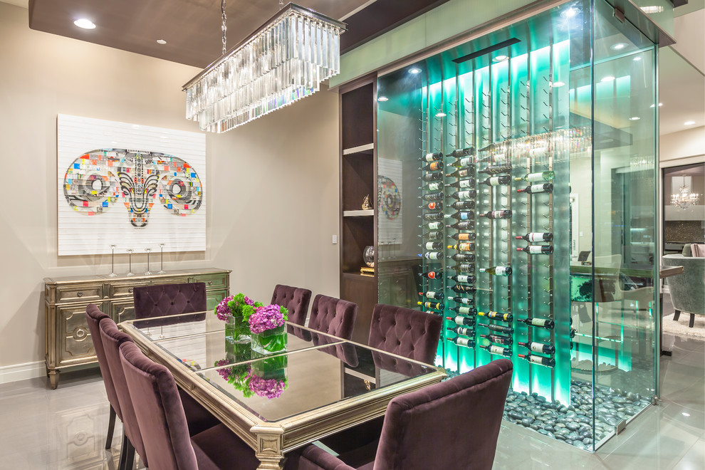 This is an example of a large contemporary open plan dining in Las Vegas with beige walls, no fireplace and grey floor.