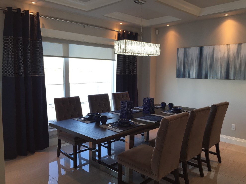 Example of a minimalist dining room design in Calgary