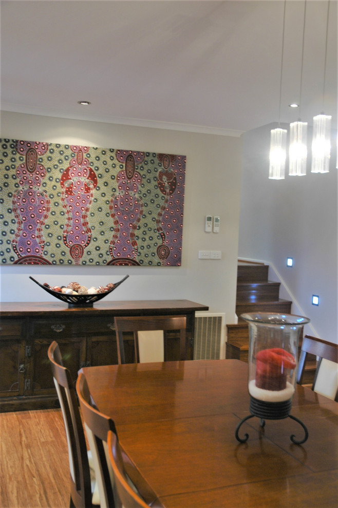 Inspiration for a large contemporary dining room in Melbourne.