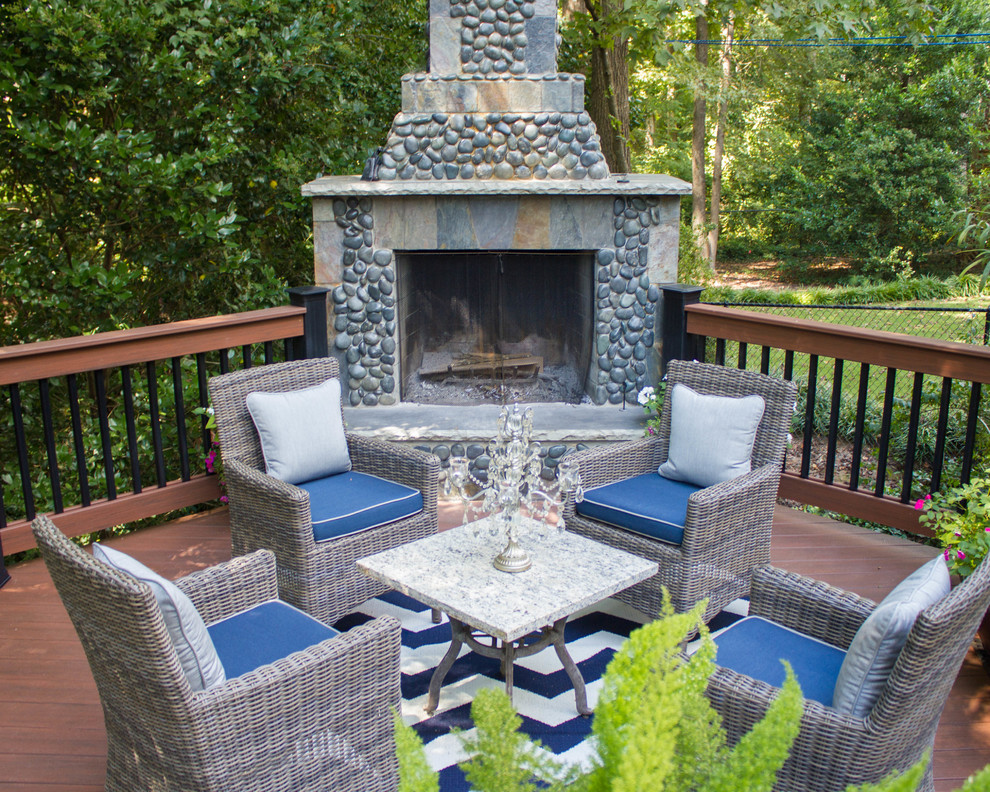 Traditional backyard deck in Atlanta with a fire feature, no cover and mixed railing.