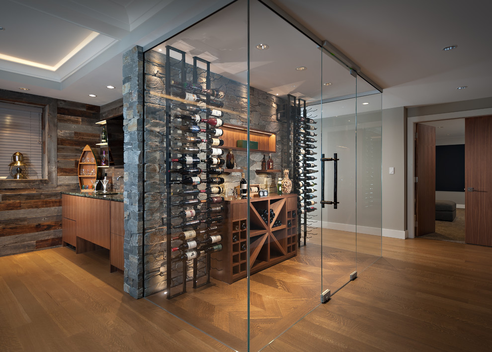 Design ideas for a transitional wine cellar in Vancouver.