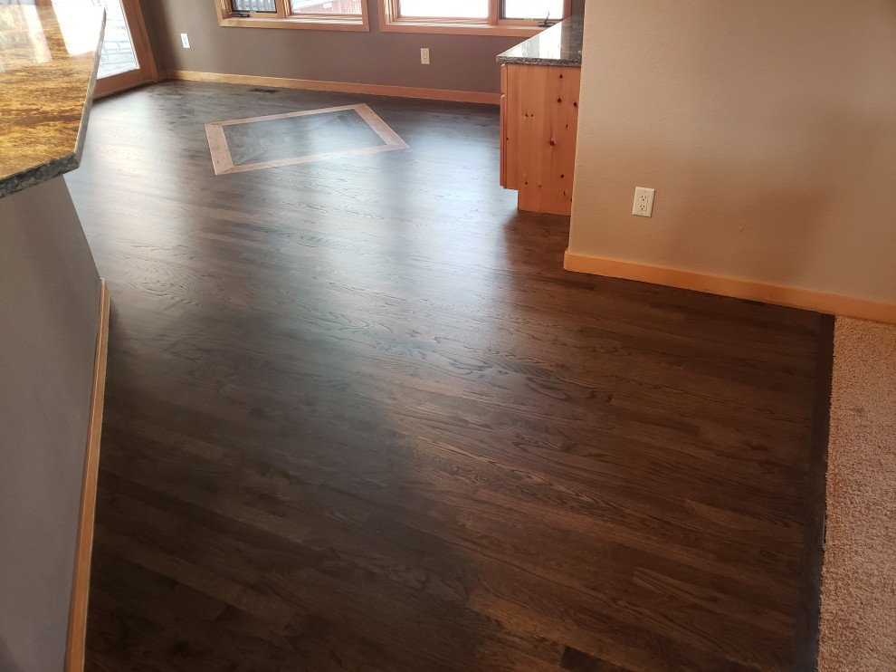 Hardwood Elegance with Custom Inlays & Entry Border