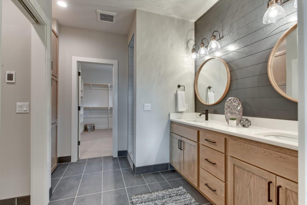 Inspiration for a transitional master double-sink bathroom remodel with shaker cabinets, light wood cabinets and a built-in vanity
