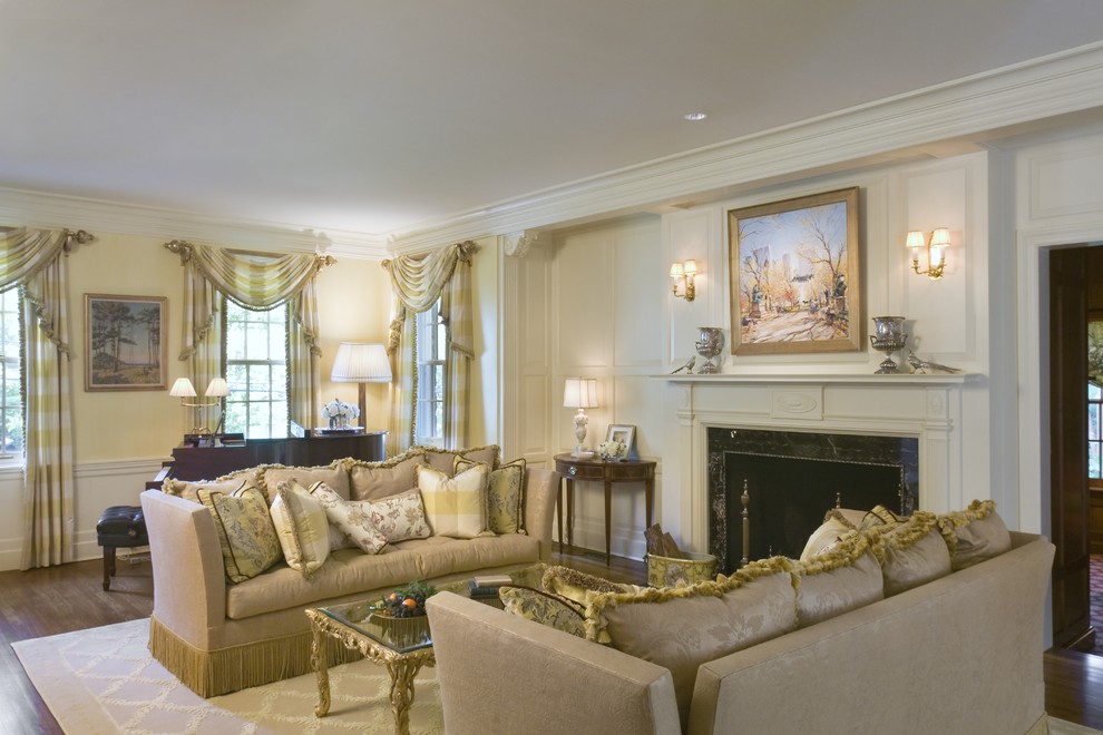 This is an example of a traditional living room in New York with yellow walls.