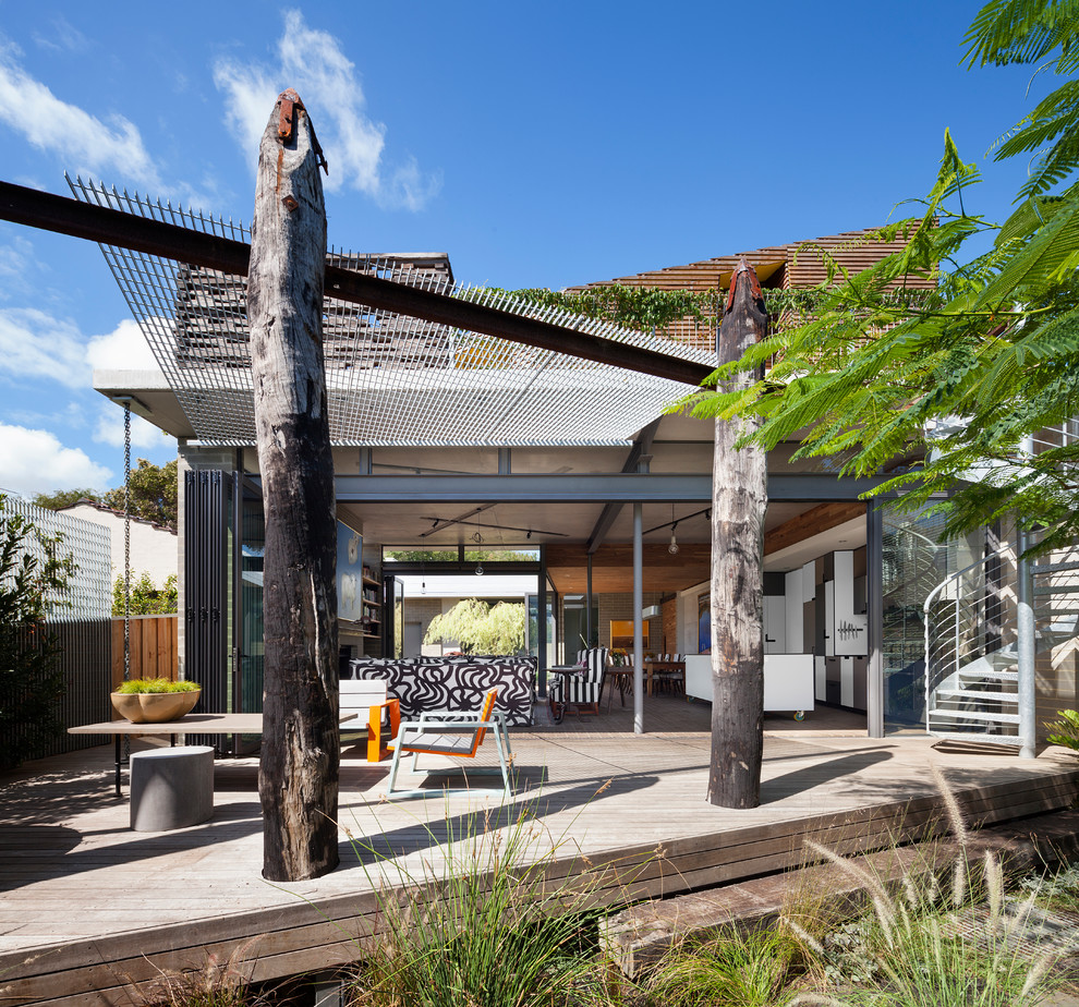 Inspiration for a contemporary backyard deck in Perth with a pergola.