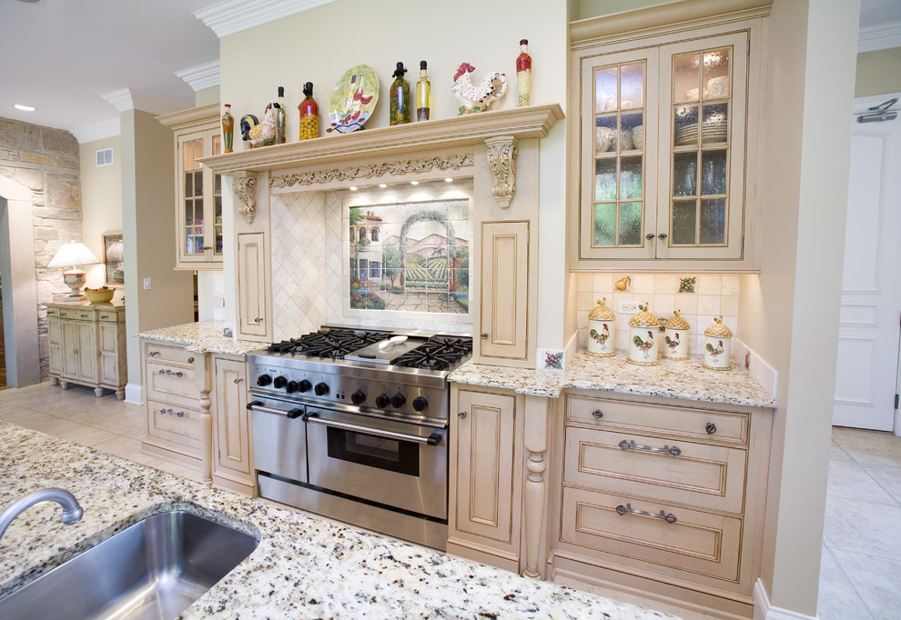 Photo of a traditional kitchen in Chicago with beaded inset cabinets.
