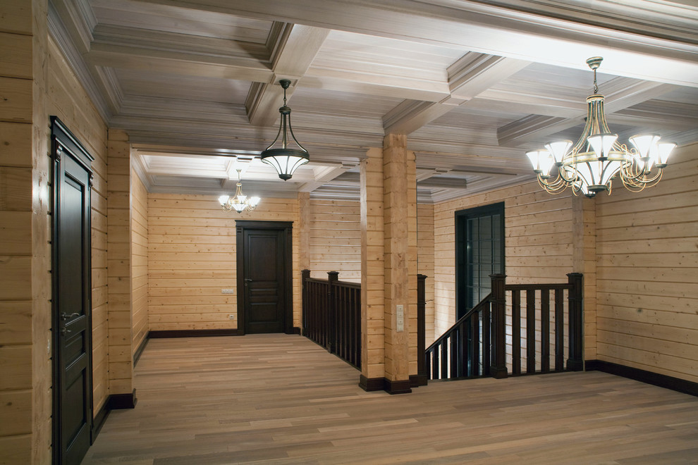 Кессонные потолки, стеновые панели, двери и кухня в деревянном доме