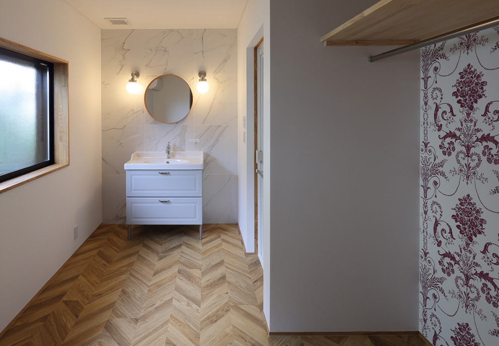 Design ideas for a medium sized scandinavian cloakroom in Other with ceramic tiles, white walls, ceramic flooring, a feature wall and a freestanding vanity unit.