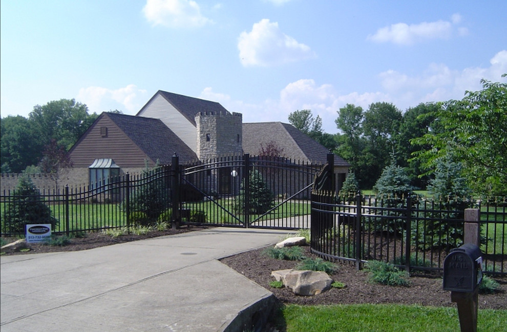 Inspiration for a mid-sized transitional front yard full sun garden for spring in Cincinnati with concrete pavers.