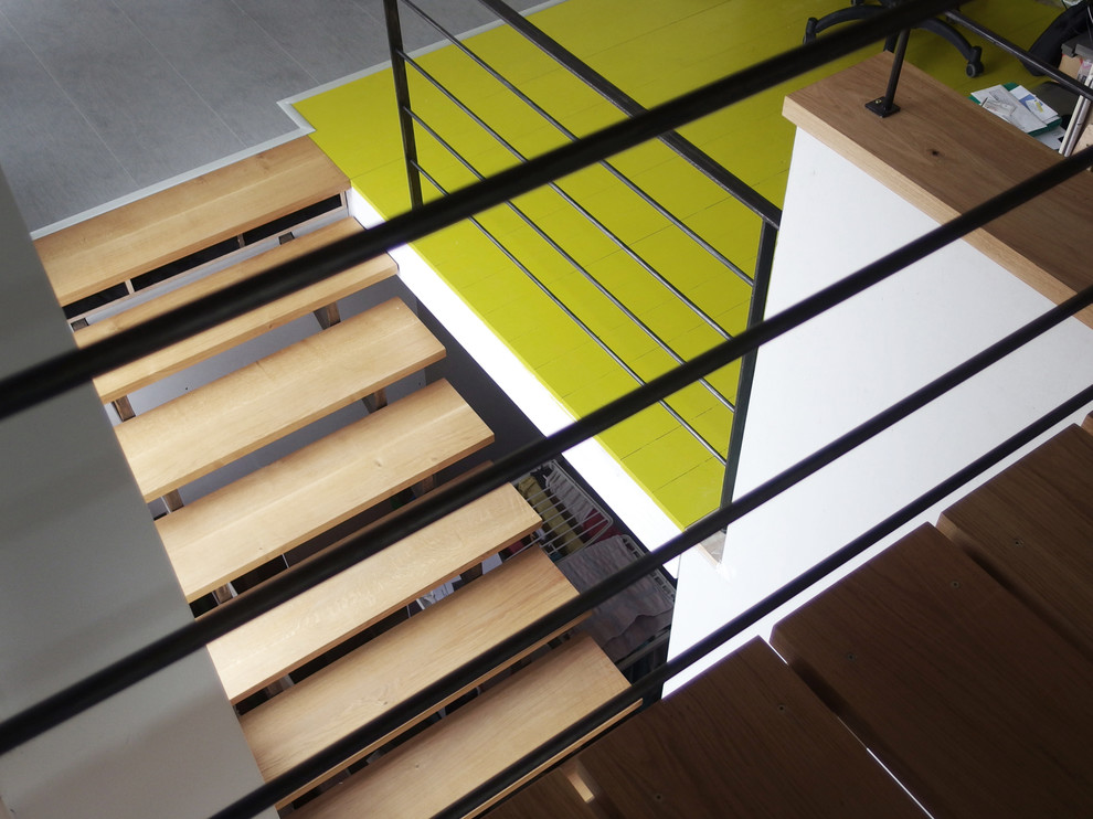 Idées déco pour escalier in U With des marches en bois.