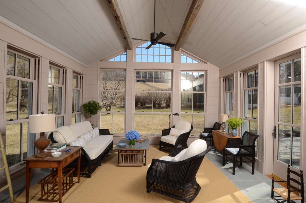 Inspiration for a traditional sunroom in New York with a standard ceiling.