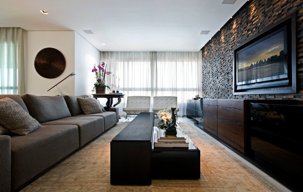 Design ideas for a contemporary open concept family room in Other with a wall-mounted tv.