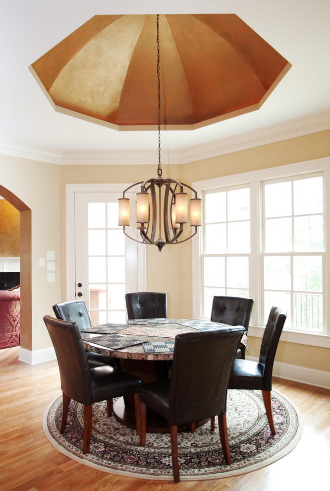 Photo of a traditional dining room in Atlanta with beige walls.