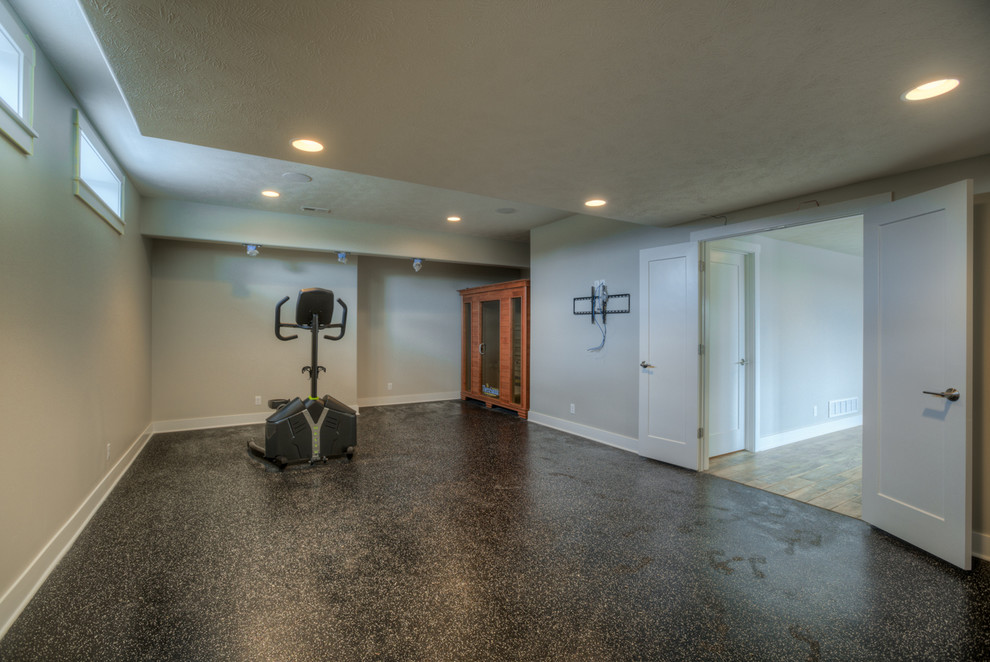 Photo of a transitional home gym in Omaha.