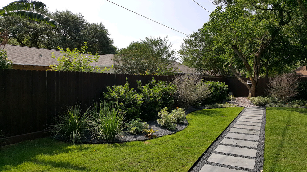 Photo of a transitional landscaping in Houston.