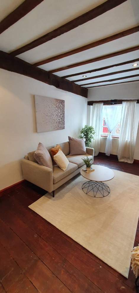 Esempio di un soggiorno design di medie dimensioni e chiuso con pareti bianche