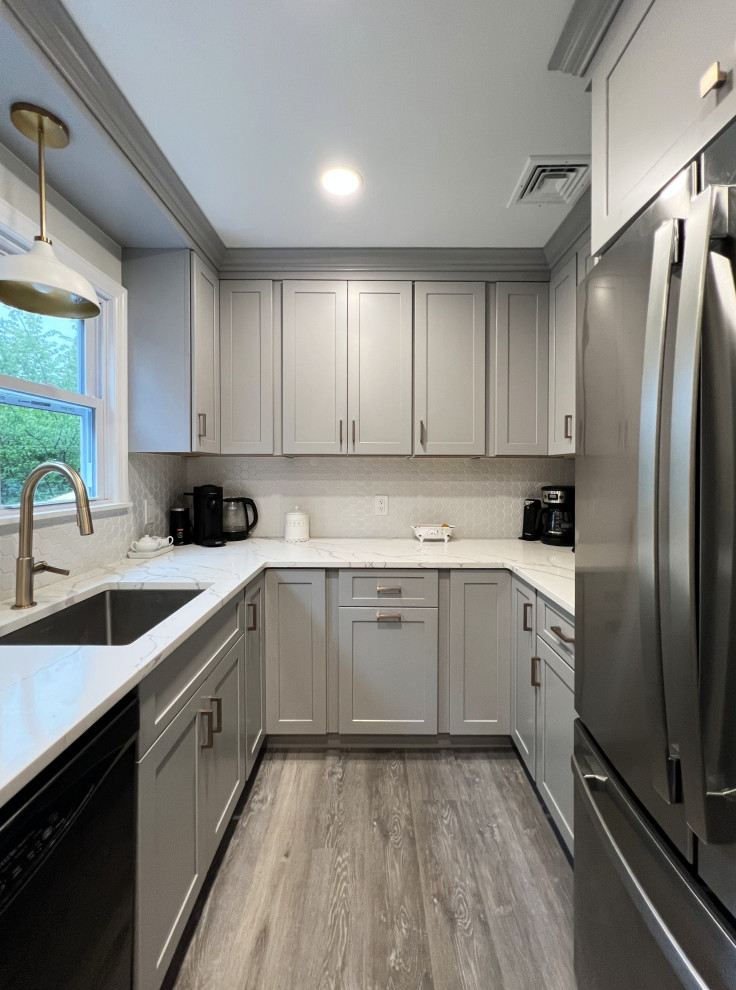 Example of a transitional kitchen design in New York