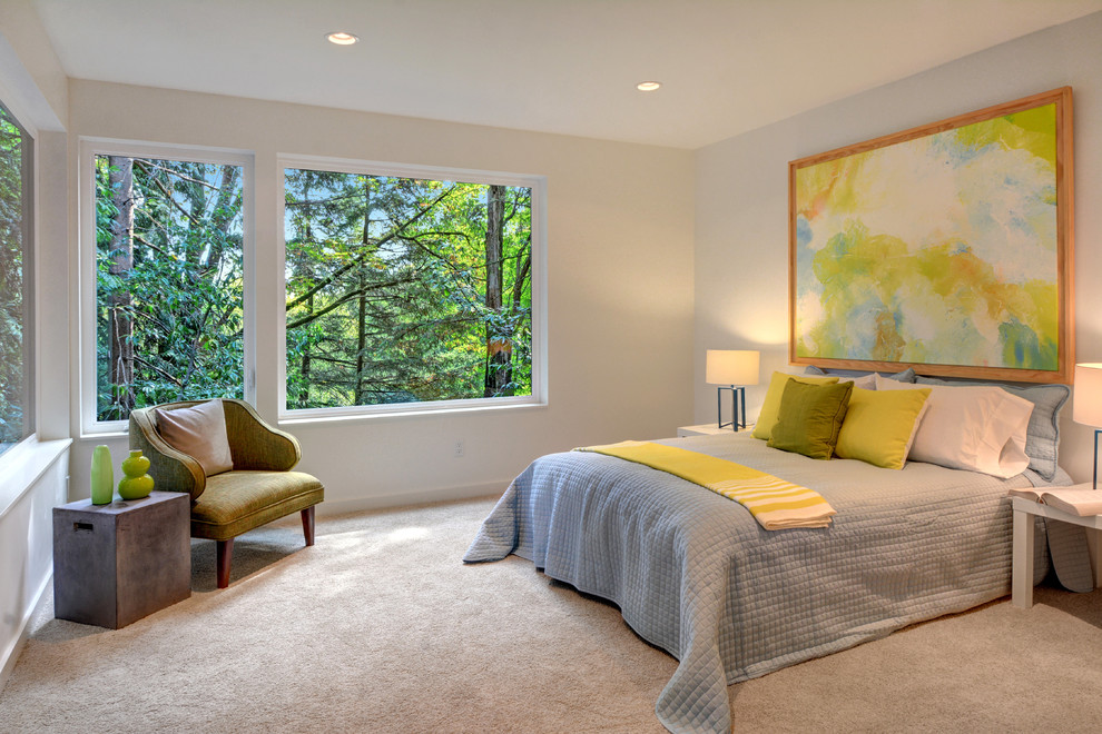 Large contemporary master bedroom in Seattle with white walls, carpet and no fireplace.