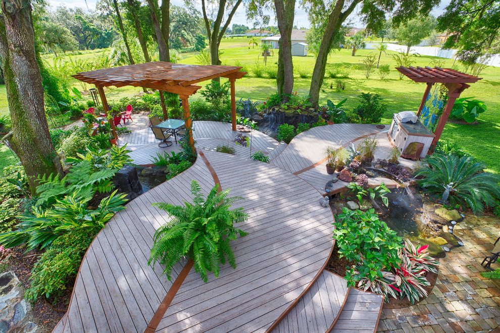 Outdoor kitchen deck - contemporary outdoor kitchen deck idea with a pergola