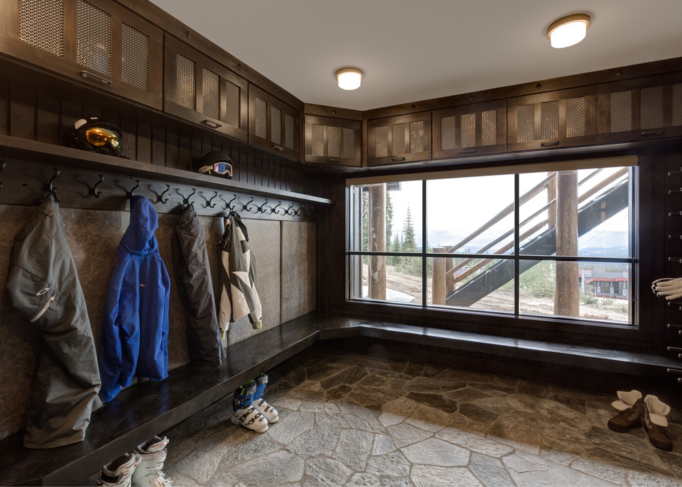 Inspiration for a large rustic slate floor and gray floor entryway remodel with beige walls