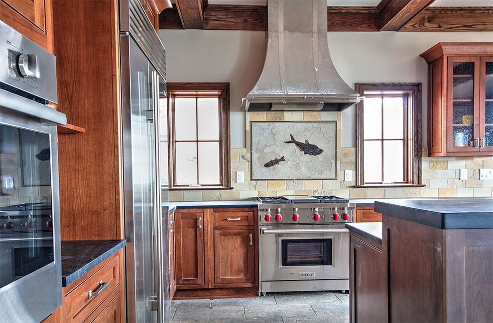 Inspiration for a huge kitchen remodel with glass-front cabinets, medium tone wood cabinets, stainless steel appliances and an island