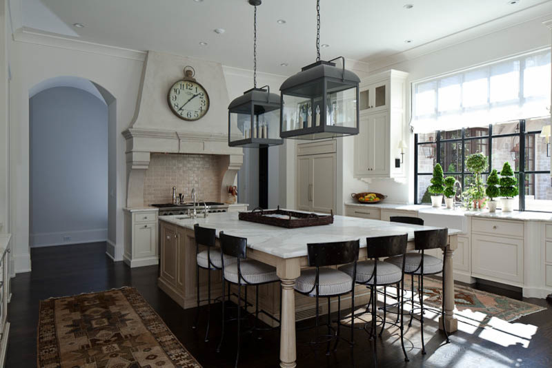 Photo of a traditional kitchen in Atlanta with white cabinets.