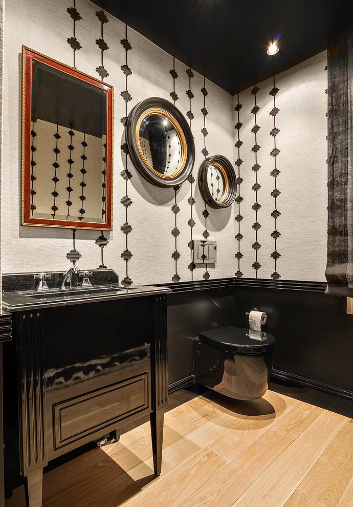 This is an example of an expansive transitional powder room in Madrid.