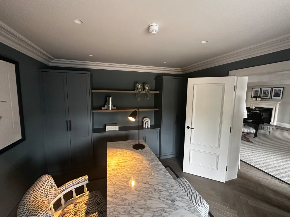 Contemporary home office in Hertfordshire with grey walls and a freestanding desk.