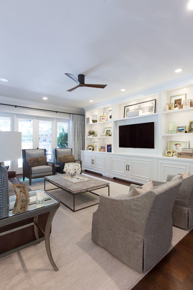 Mid-sized transitional formal living room in Orlando with white walls, dark hardwood floors and a wall-mounted tv.