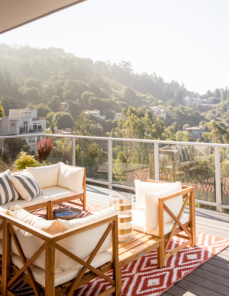 Design ideas for a modern rooftop deck in San Francisco with glass railing.