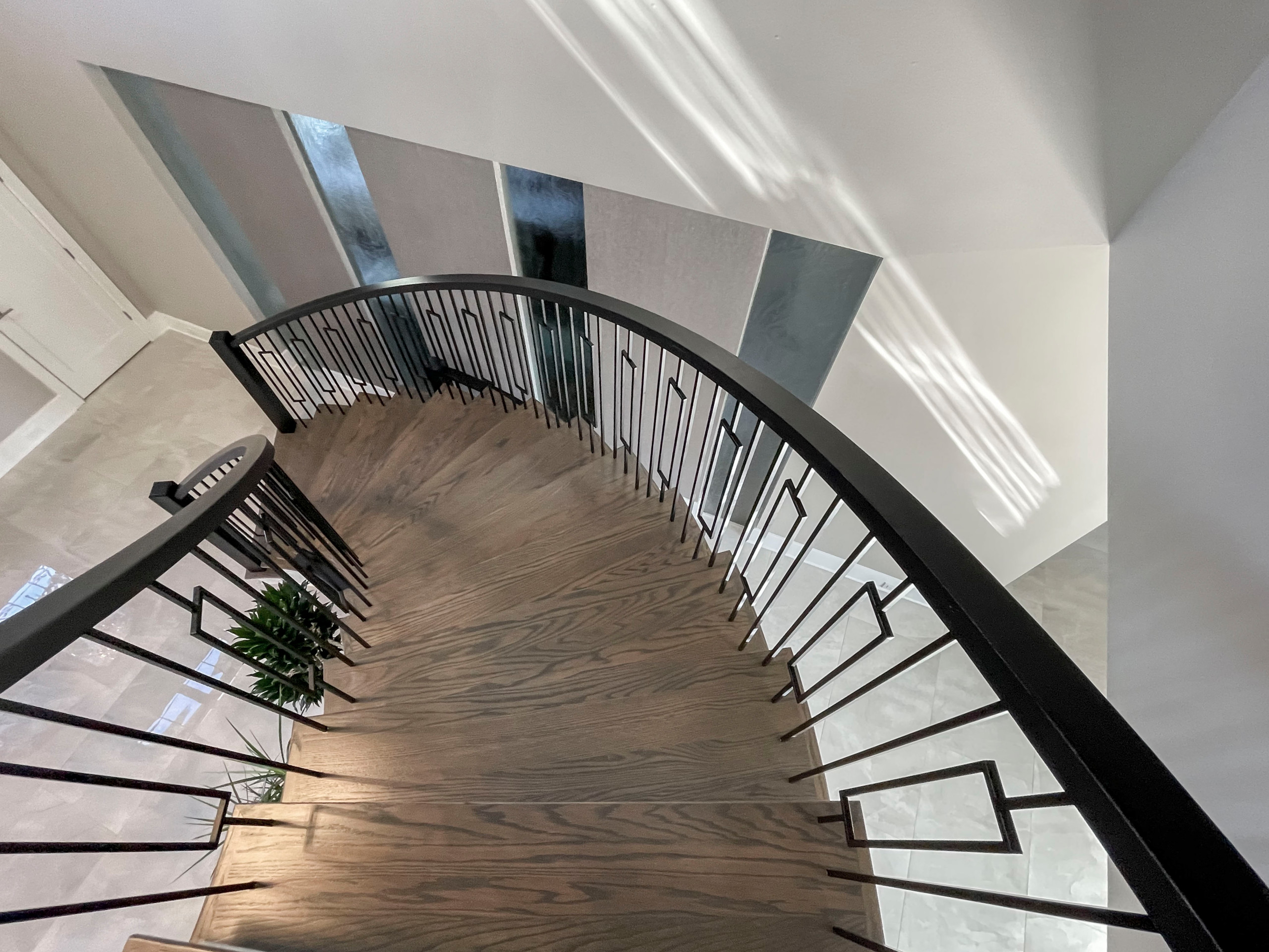 Project #114 | Freestanding Curved Foyer Staircase