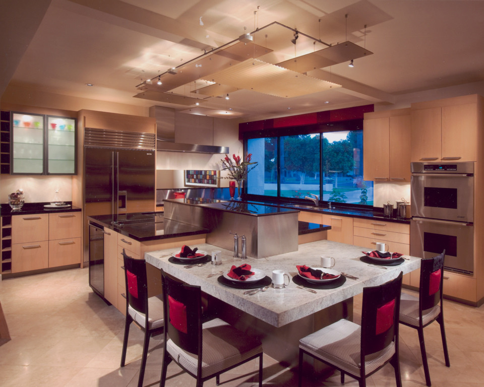 Photo of a contemporary kitchen in Phoenix with stainless steel appliances and with island.
