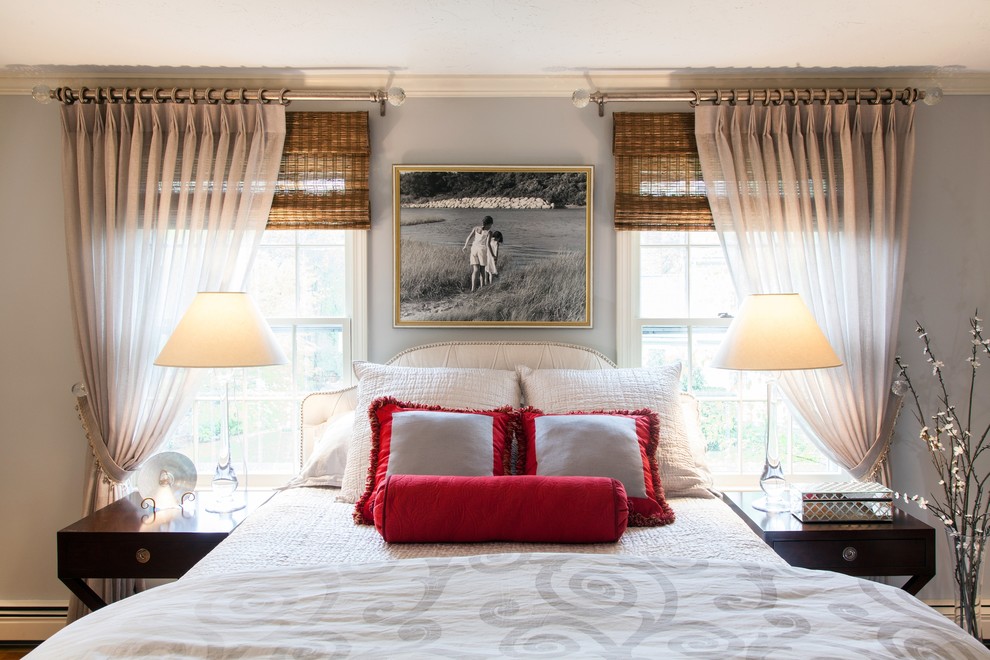 Inspiration for a transitional master bedroom in Boston with grey walls and medium hardwood floors.