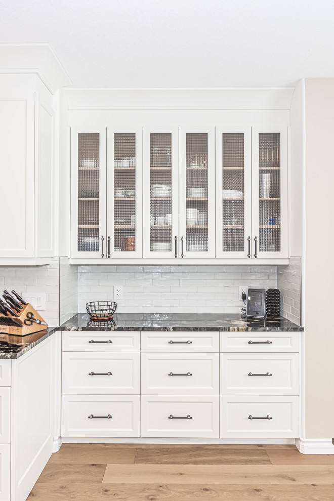 Example of a transitional kitchen design in Edmonton