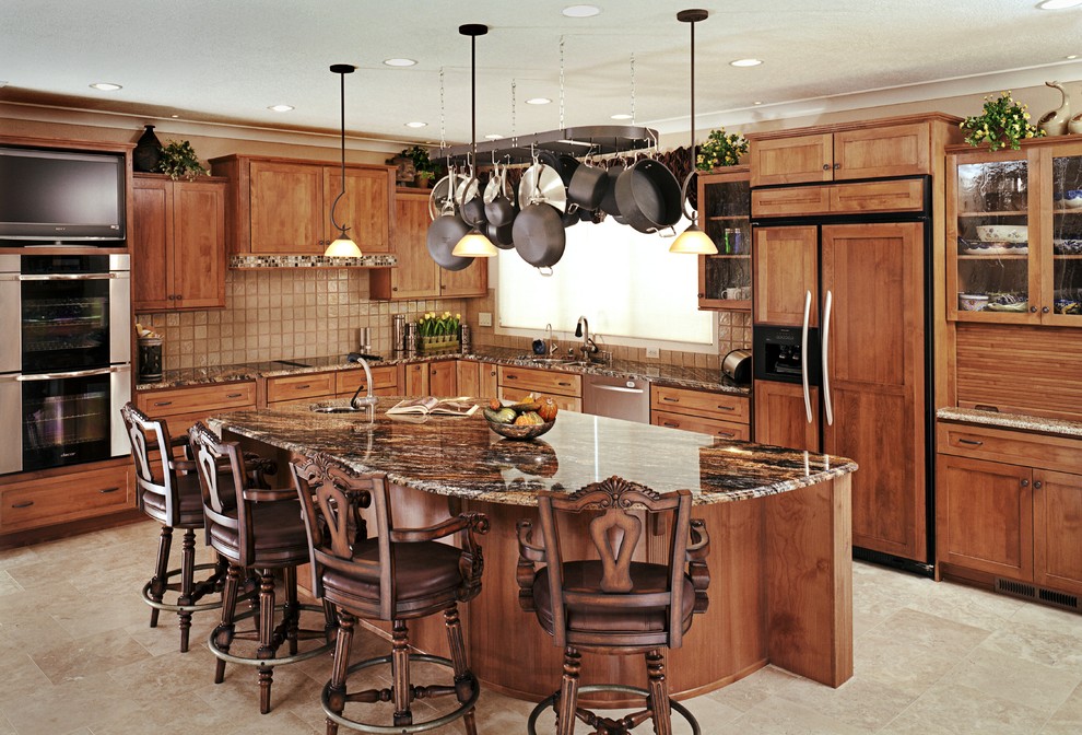 This is an example of a large traditional l-shaped eat-in kitchen in Albuquerque with an undermount sink, shaker cabinets, medium wood cabinets, granite benchtops, beige splashback, ceramic splashback, panelled appliances, porcelain floors, with island, white floor and multi-coloured benchtop.