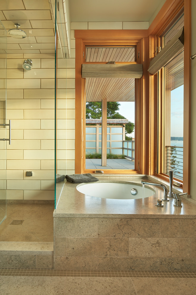 This is an example of a beach style bathroom in Seattle with a hinged shower door.