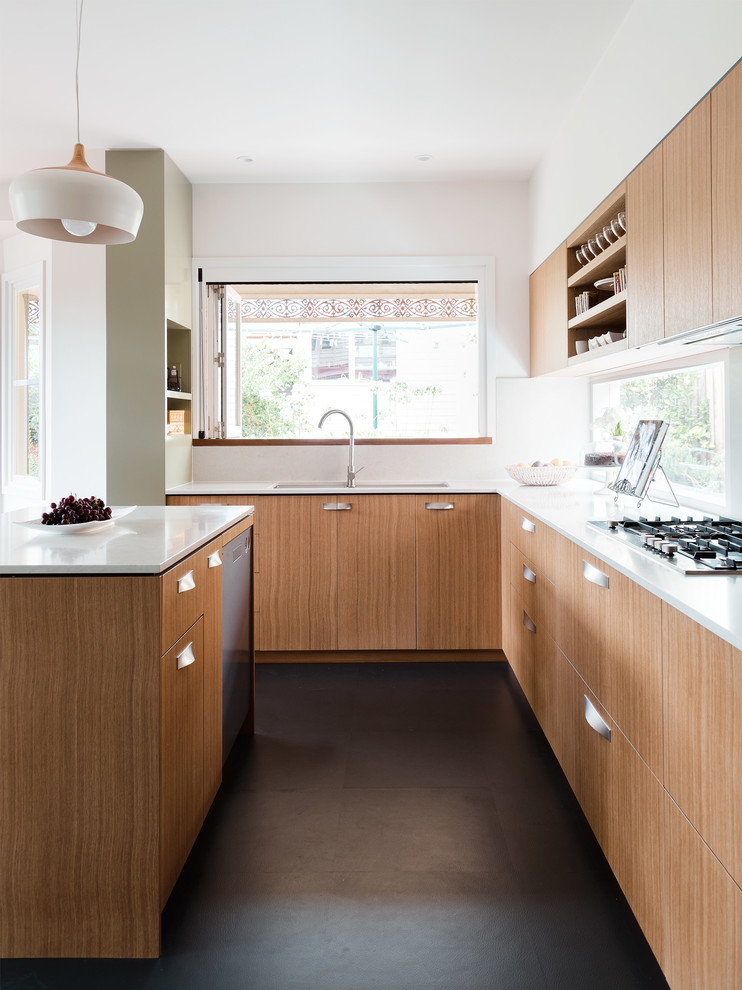 Photo of a mid-sized contemporary u-shaped eat-in kitchen in Melbourne with a double-bowl sink, medium wood cabinets, quartz benchtops, white splashback, stone slab splashback, stainless steel appliances and with island.