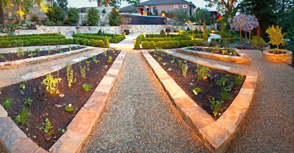 Inspiration for a large mediterranean full sun backyard stone formal garden in San Francisco for summer.