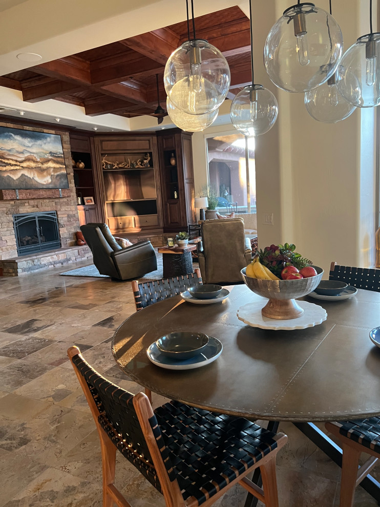 Kitchen - huge travertine floor, beige floor and tray ceiling kitchen idea in Phoenix with a double-bowl sink, glass-front cabinets, dark wood cabinets, granite countertops, gray backsplash, stone slab backsplash, stainless steel appliances, an island and gray countertops