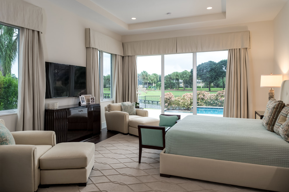 Inspiration for a mid-sized transitional master dark wood floor bedroom remodel in Miami with beige walls